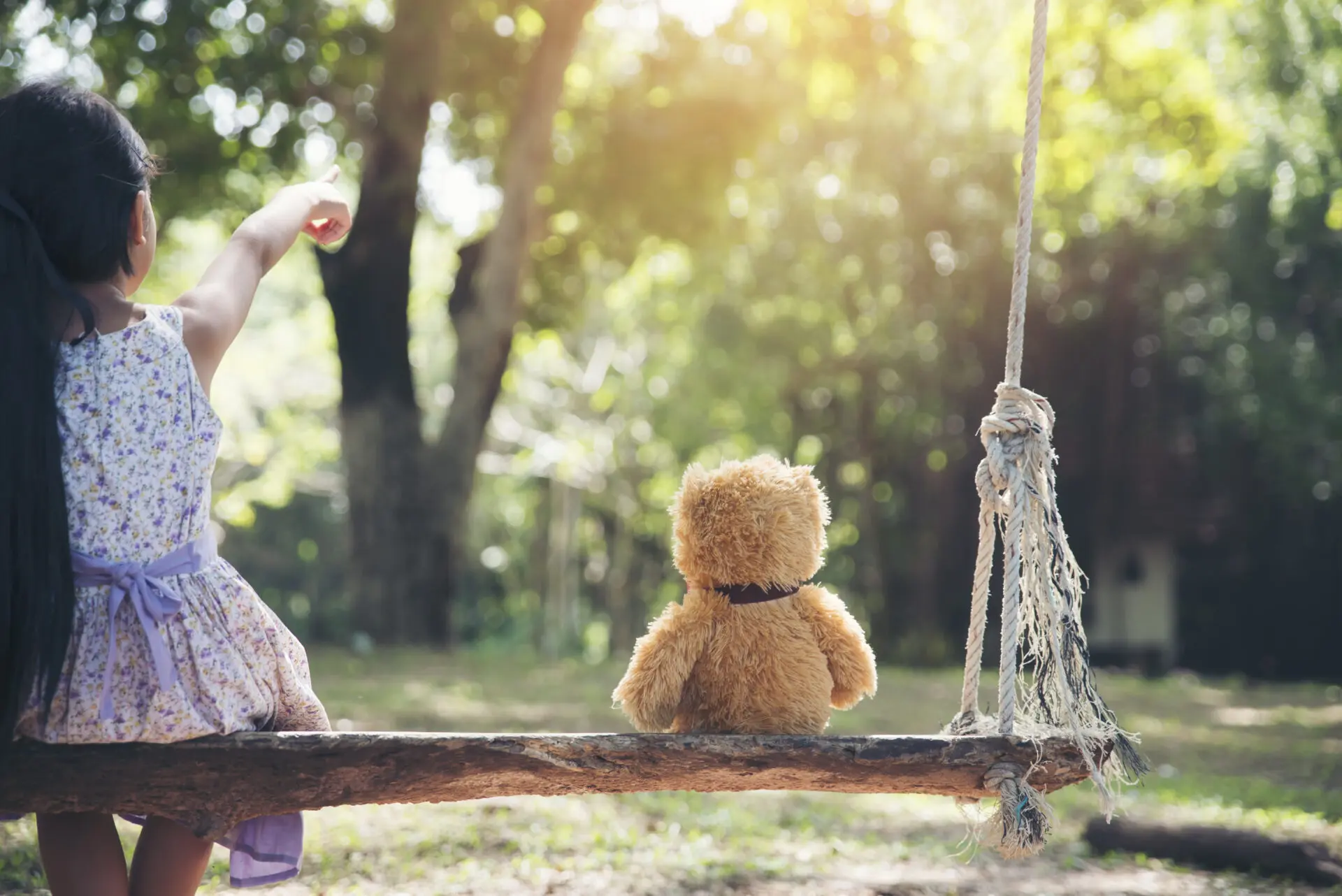 Cute,Little,Girl,Sitting,Swings,,,Teddy,Bear,Sitting,With